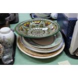 A selection of Victorian and later meat plates plus a large stoneware bowl