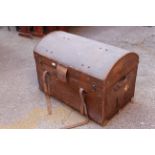 A vintage canvas travelling trunk