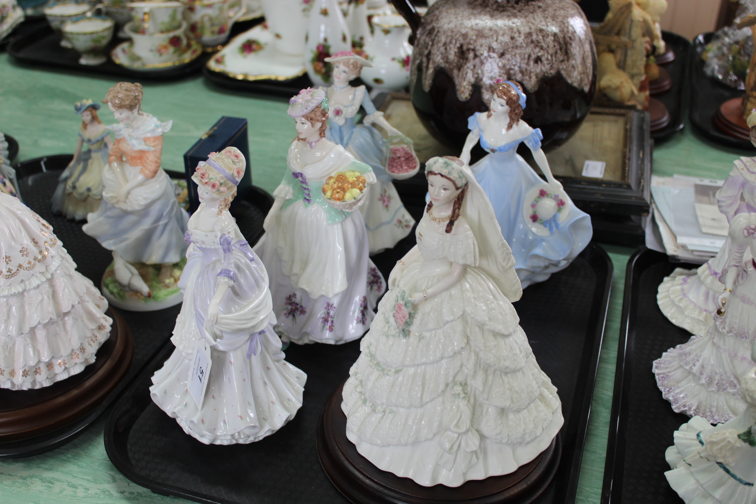 Six Coalport figurines including three 'Cries of London', Princess Alexandra and Pamela,