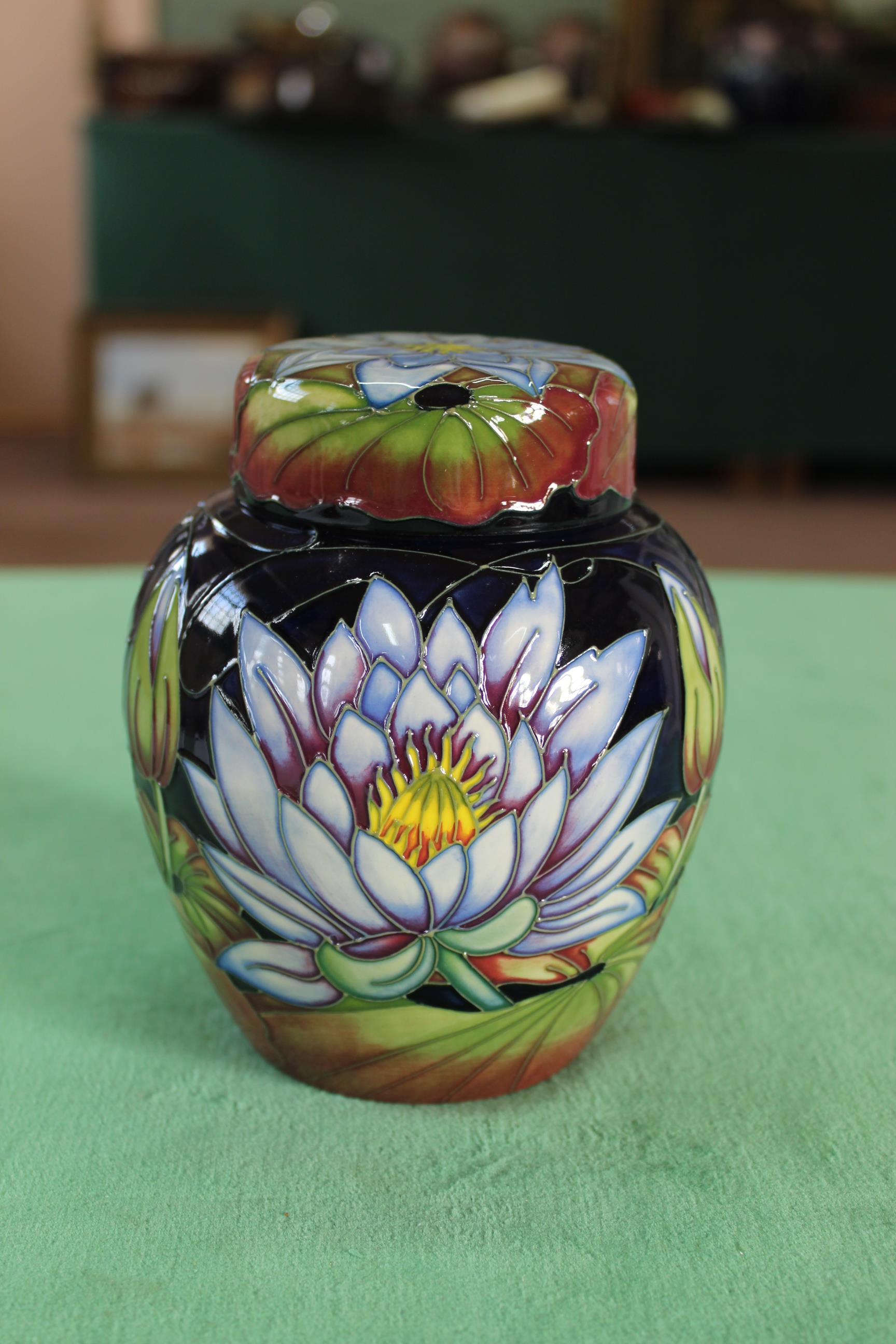 A Moorcroft 'Blue Lotus' pattern lidded ginger jar, 2009 by R Bishop, 6" high,