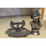 A 20th Century female bust plus a cast iron foot scraper