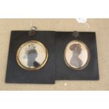 Two early 19th Century silhouettes in original black papier mache frames
