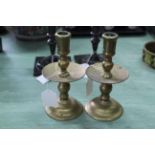 A pair of antique Dutch brass Heemskerk candlesticks (possibly 18th Century) with ejection nozzles,