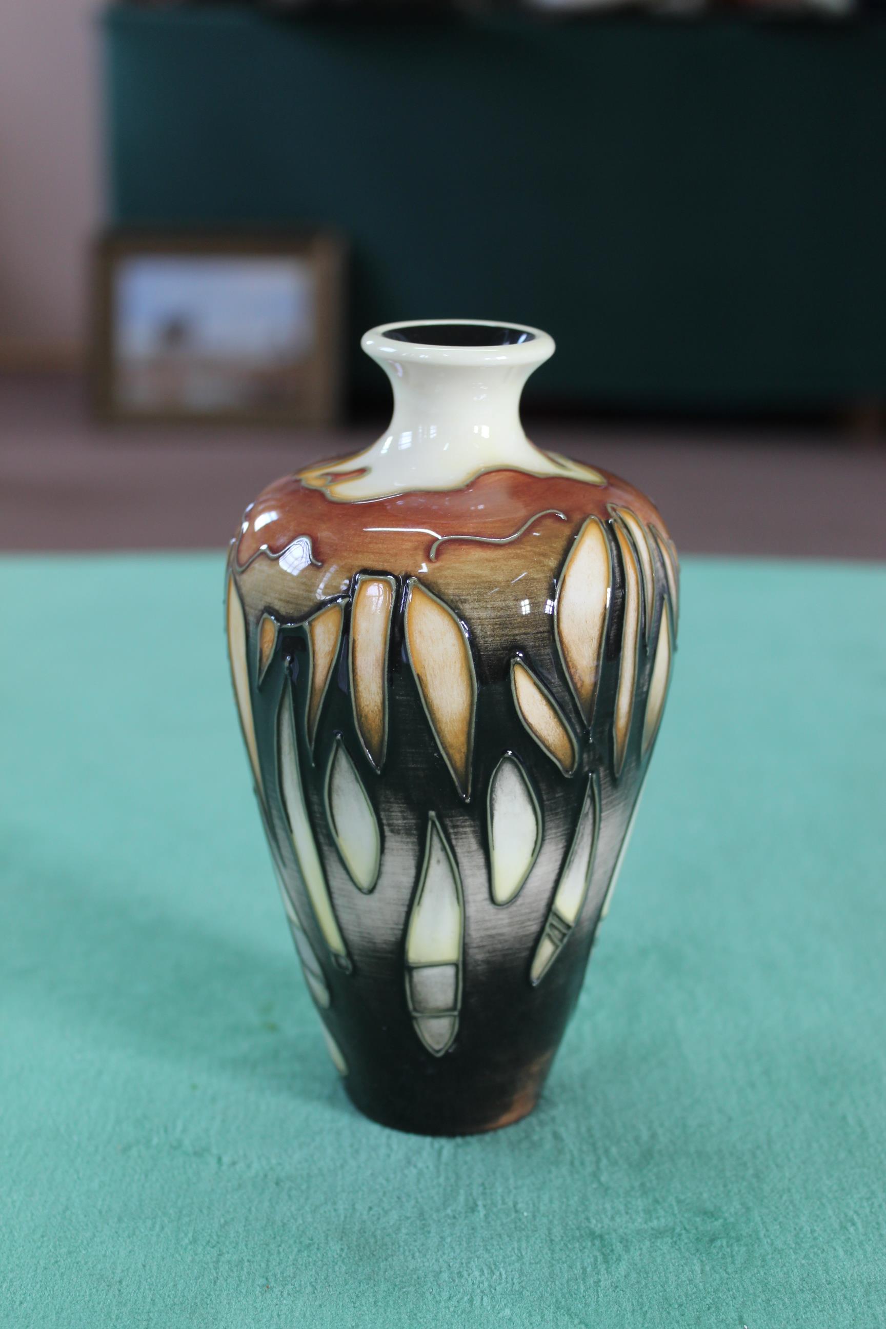 A Moorcroft 'La Garenne' pattern vase, 2005 by Emma Bosson, 6" tall,