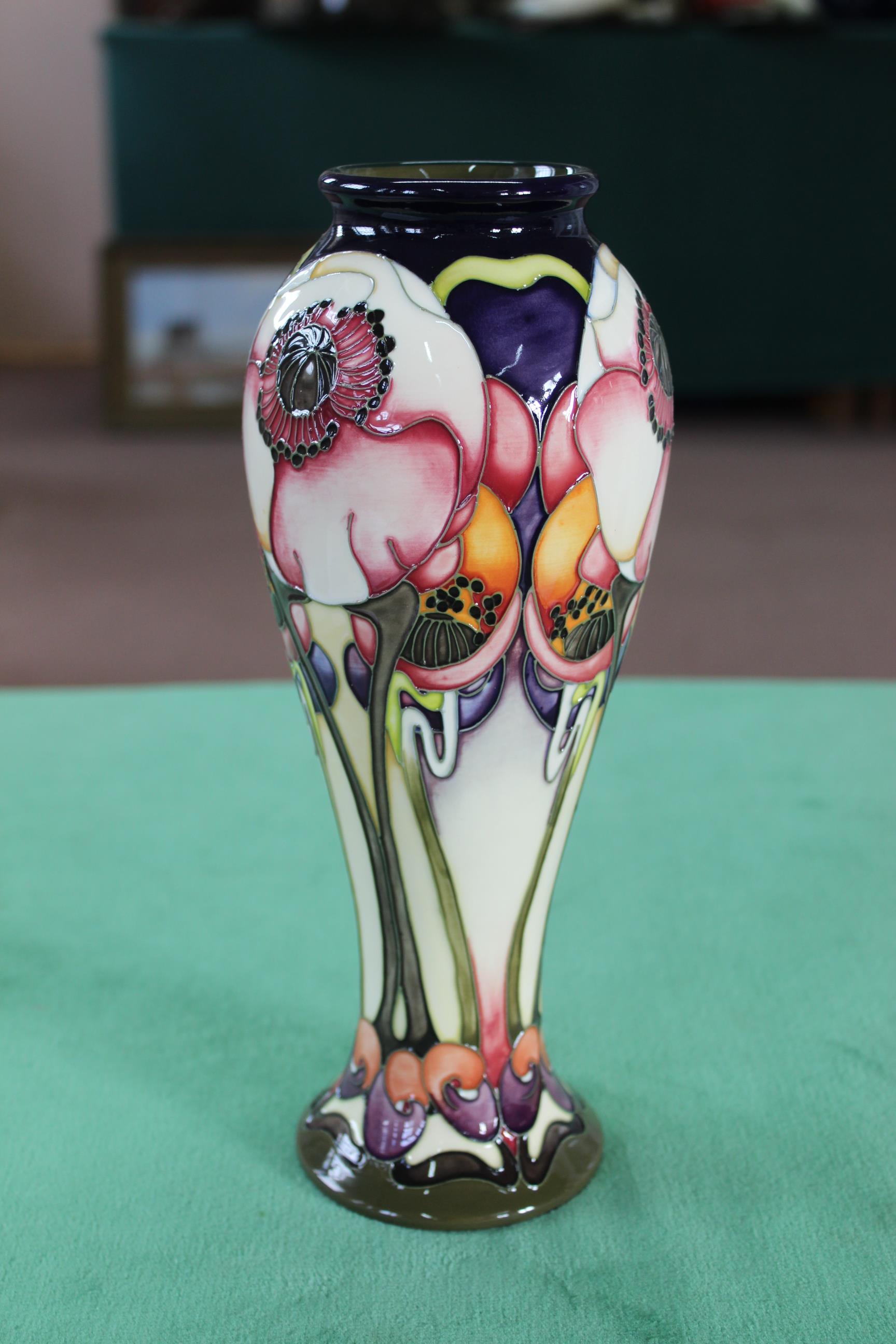 A Moorcroft floral pattern vase, 2006 by E Bossons, limited edition 29/500, 11" high,