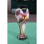 A Moorcroft floral pattern vase, 2006 by E Bossons, limited edition 29/500, 11" high,