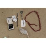 Five Roman items including a lead weight, a ring,