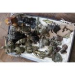 A tray with an extensive collection of bronze, spelter and wood, Indian,