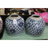 A pair of 19th Century Chinese hand painted ginger jars (lacking lids)
