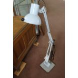 An adjustable desktop inspection lamp
