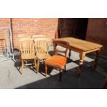 A Victorian style kitchen table with four beech and elm chairs and one other