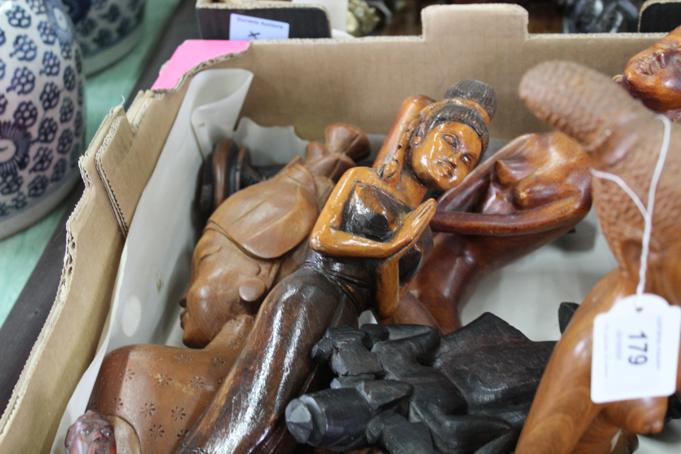 A selection of carved wooden Indian style figures including odd stone pieces, - Bild 3 aus 3