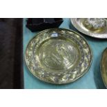 A 17th Century brass alms dish,