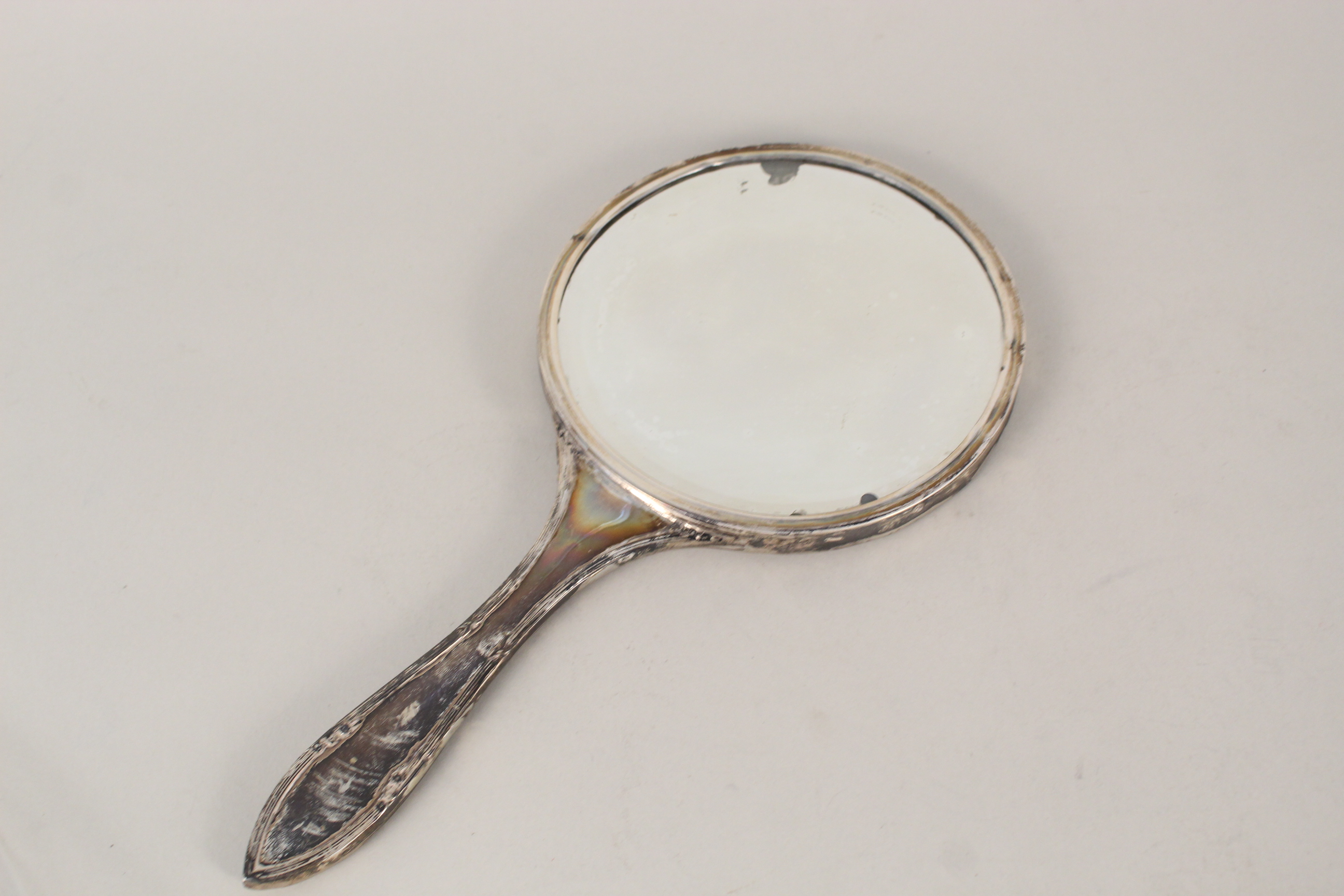 A silver and tortoiseshell hand mirror (as found) together with a silver cigarette case with engine - Image 6 of 6
