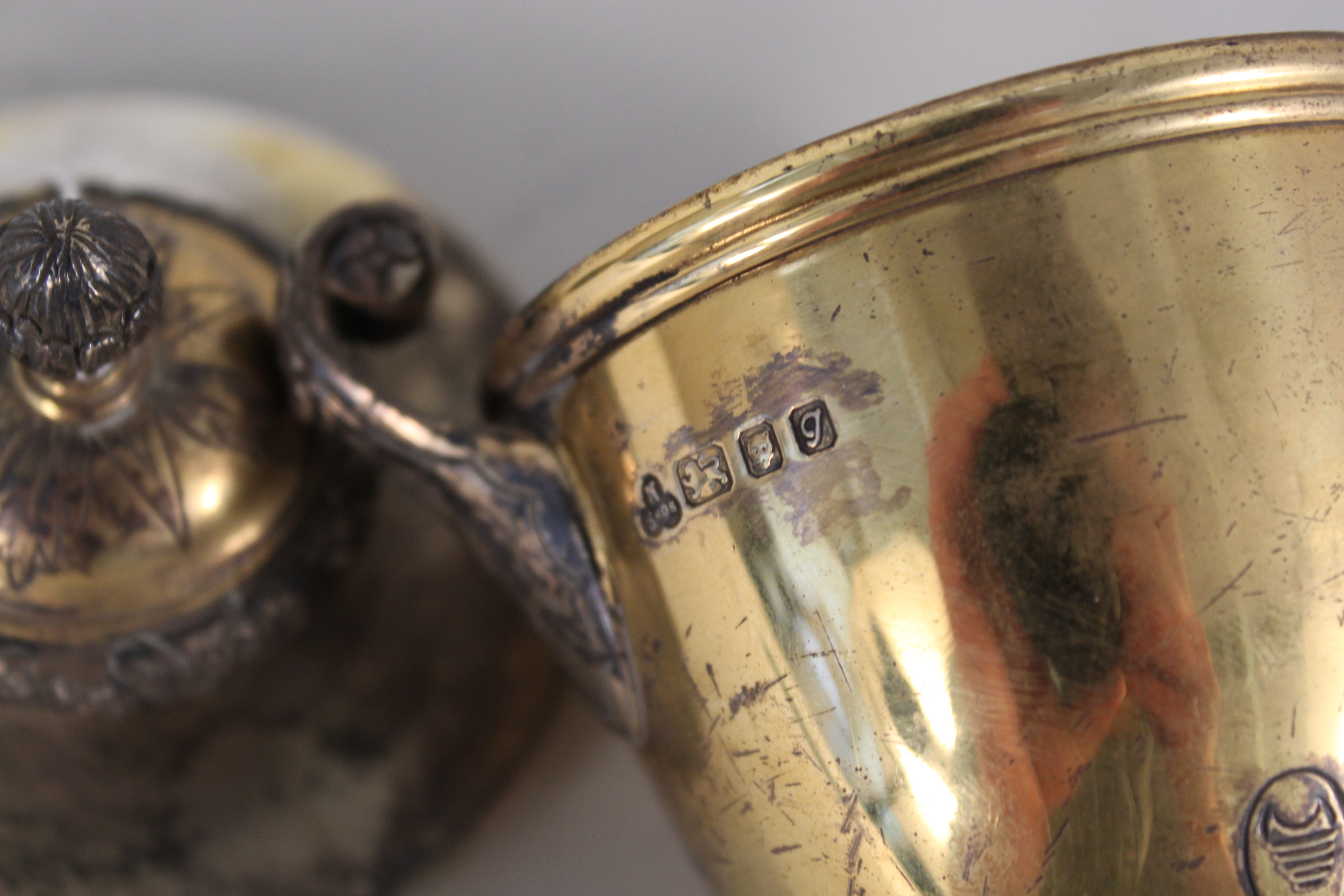 A silver gilt lidded urn with raised and etched decoration of acorn finials, - Image 4 of 4