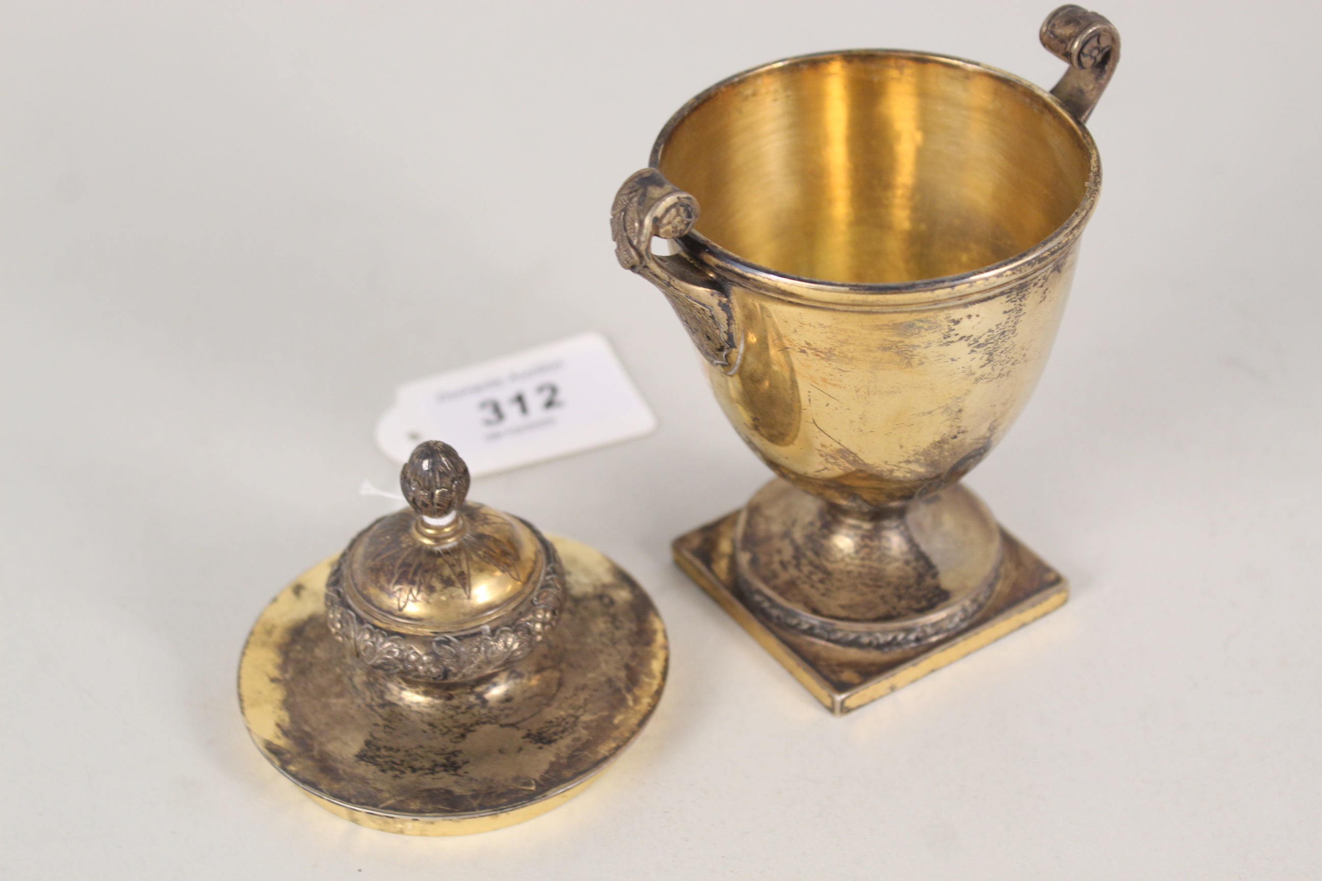 A silver gilt lidded urn with raised and etched decoration of acorn finials, - Image 2 of 4