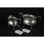 A silver sugar and cream jug, Birmingham 1923,