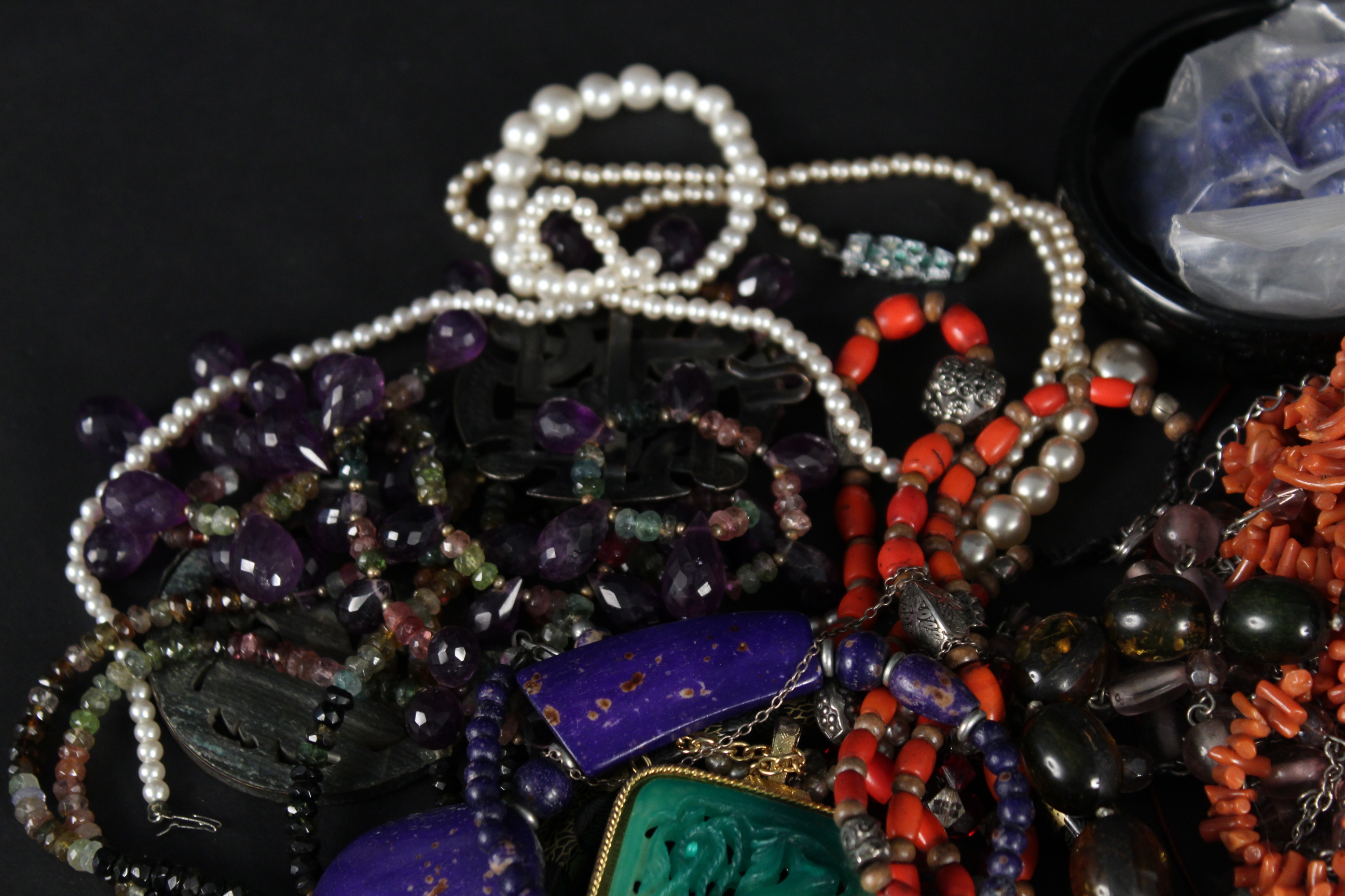 A quantity of bead necklaces, including coral, amethyst etc, bracelets including bone, - Image 2 of 3