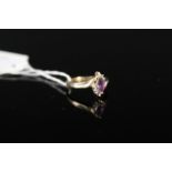 A 9ct gold amethyst and diamond ring, size N,