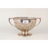 An octagonal shaped two handled cup on flared pedestal base, hallmarked Birmingham 1912,