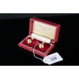 A pair of 18ct gold matt effect ball cufflinks,