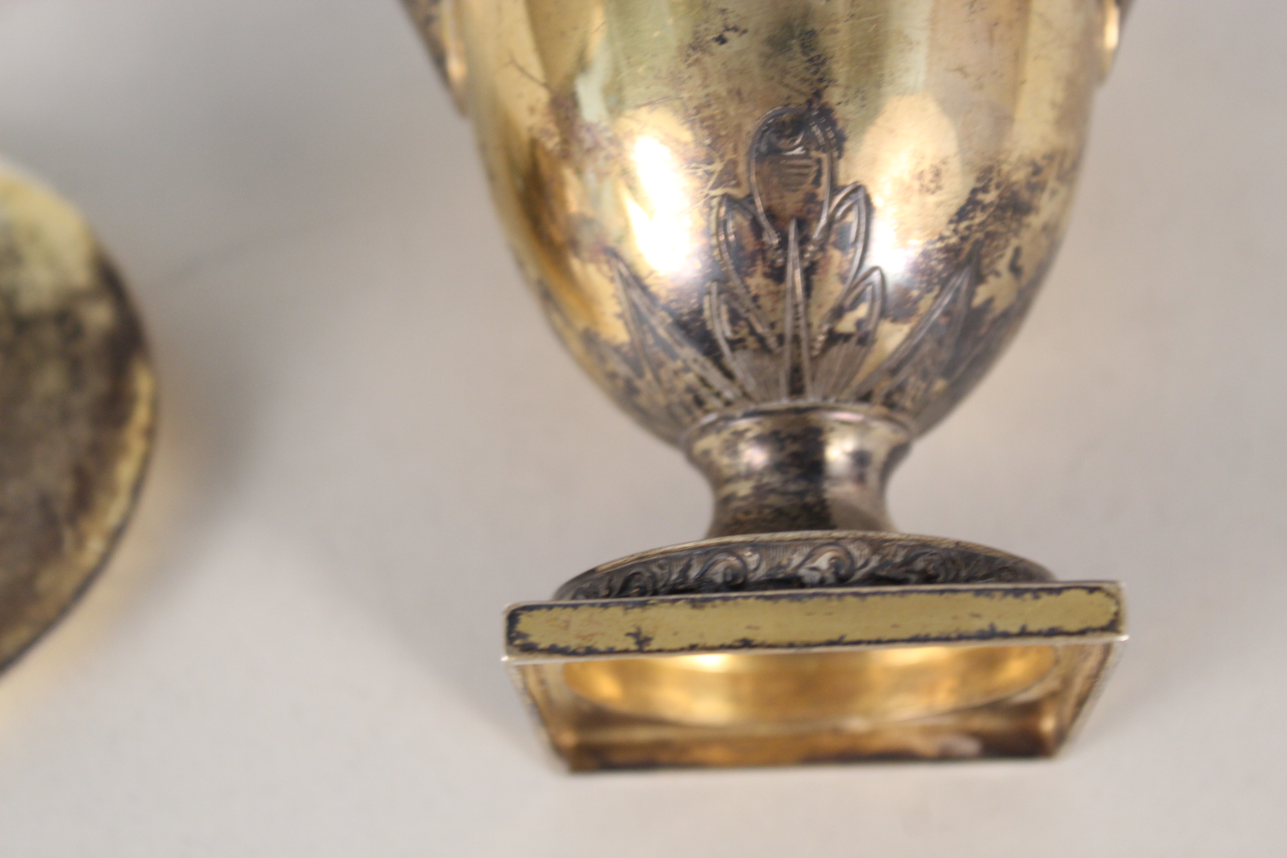 A silver gilt lidded urn with raised and etched decoration of acorn finials, - Image 3 of 4