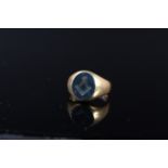An 18ct gold signet ring set with bloodstone engraved with Masonic insignia, size N,