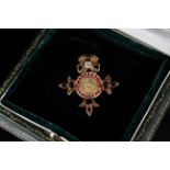 An 18ct gold commemorative Imperial brooch set with rubies, sapphires and diamond,