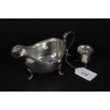 A silver Walker & Hall sauce boat together with a silver salt,