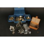 A collection of costume jewellery, a leather jewellery box, large metal necklaces,