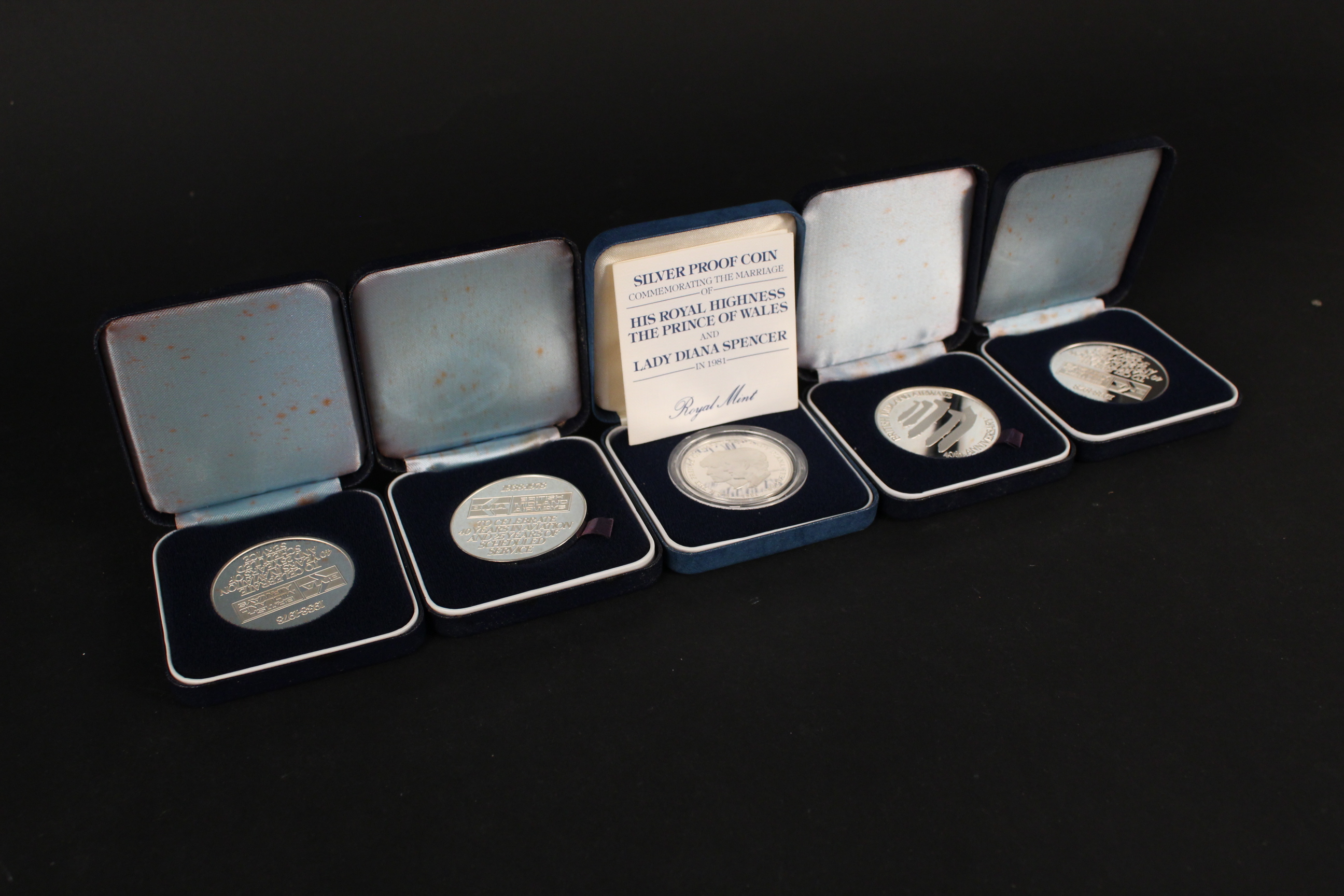 Four silver medallions commemorating the 40th Anniversary of British Midland Airways together with