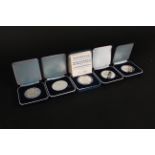 Four silver medallions commemorating the 40th Anniversary of British Midland Airways together with