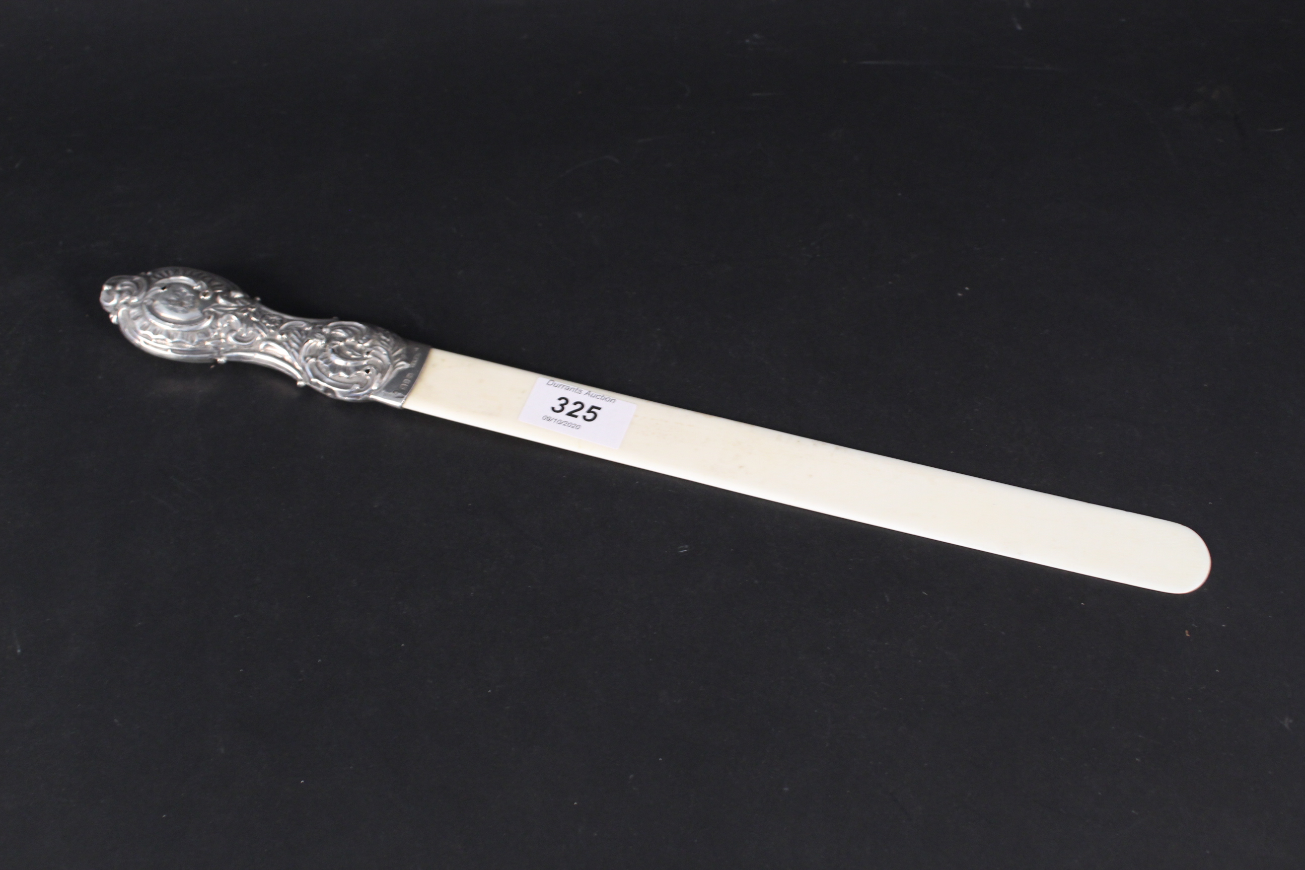 A silver handle ivory bladed page turner (some losses to silver),