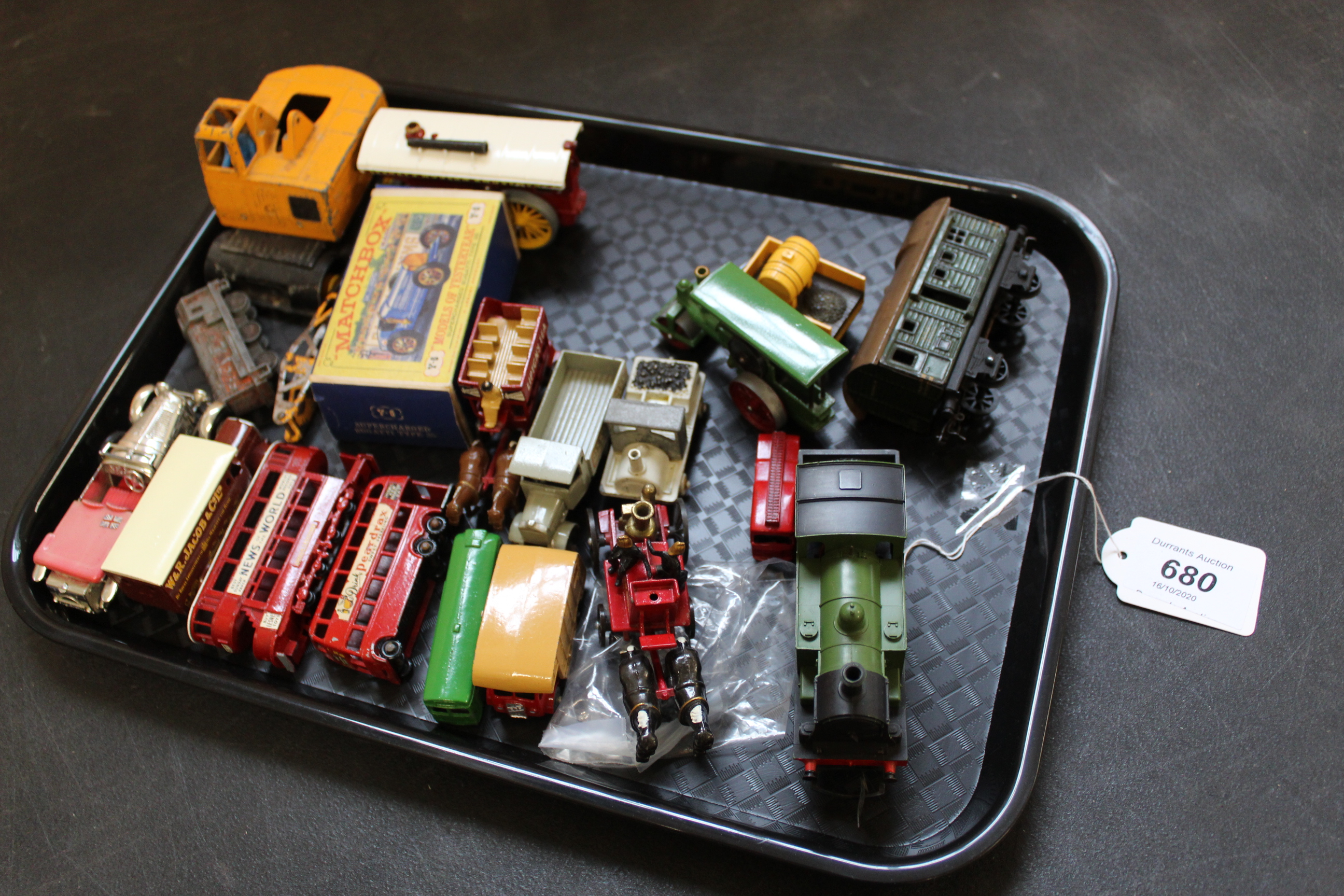 A tray with a selection of vintage tin plate cars, trains and carriages, Dinky, Matchbox,
