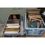 Two tubs of framed photographs of actors with stills from films and TV from the 1950's-80's