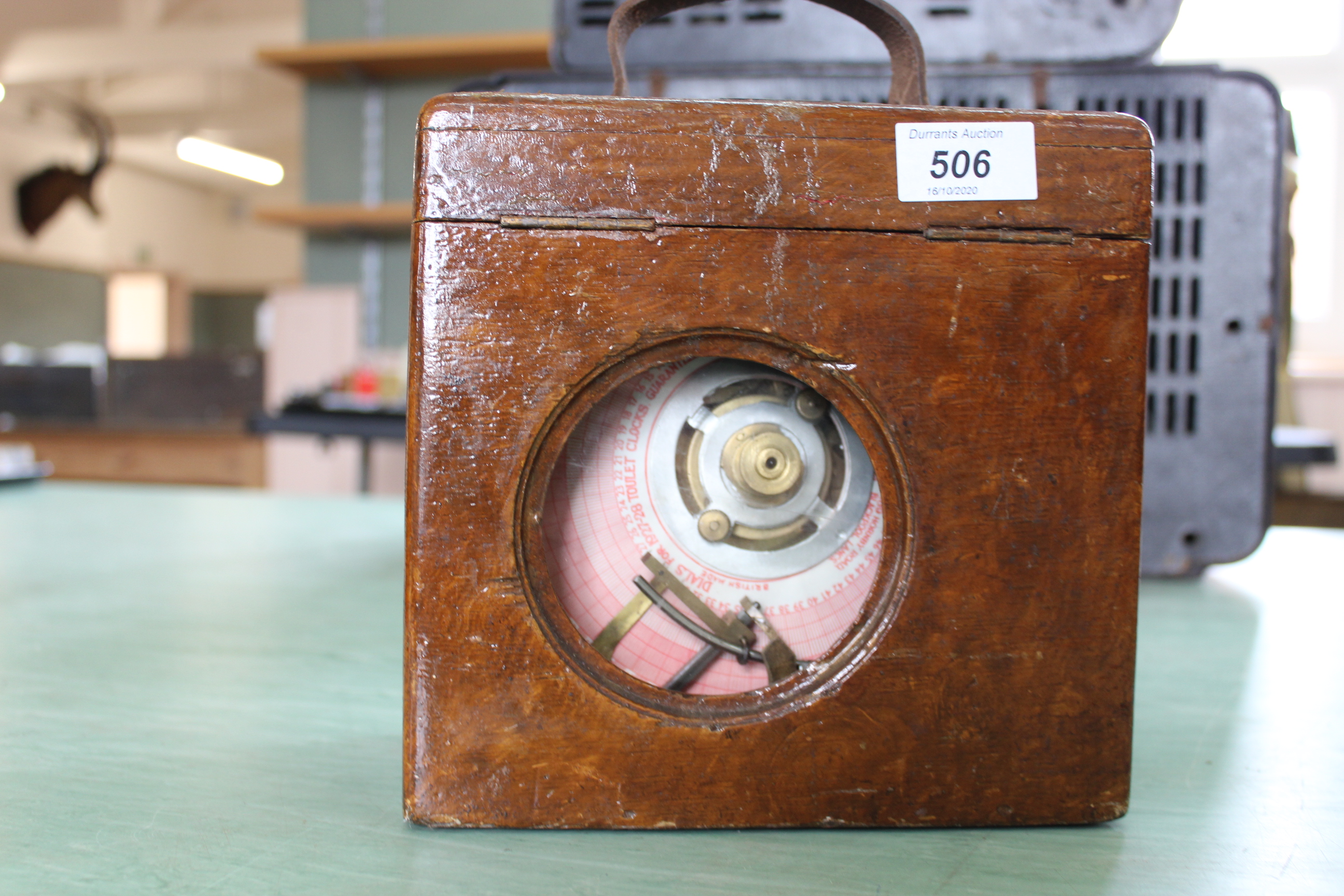 A vintage cased pigeon time clock by 'Tourlet Excelsior,