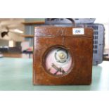 A vintage cased pigeon time clock by 'Tourlet Excelsior,