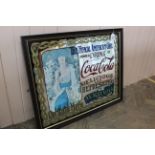 A 'Coca Cola' advertising mirror,