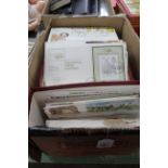 A box with an extensive collection of decimal first day covers,