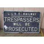 A cast iron L & N E Railway 'Trespassers Will Be Prosecuted' plate,