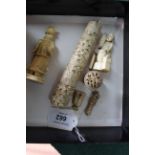 Two antique carved ivory figures, man in robes 3 1/2" high, Chinese figure with baskets,