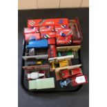 A tray with fifteen boxed Corgi die cast vehicles,