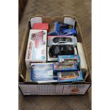 A large selection of mainly boxed cars,