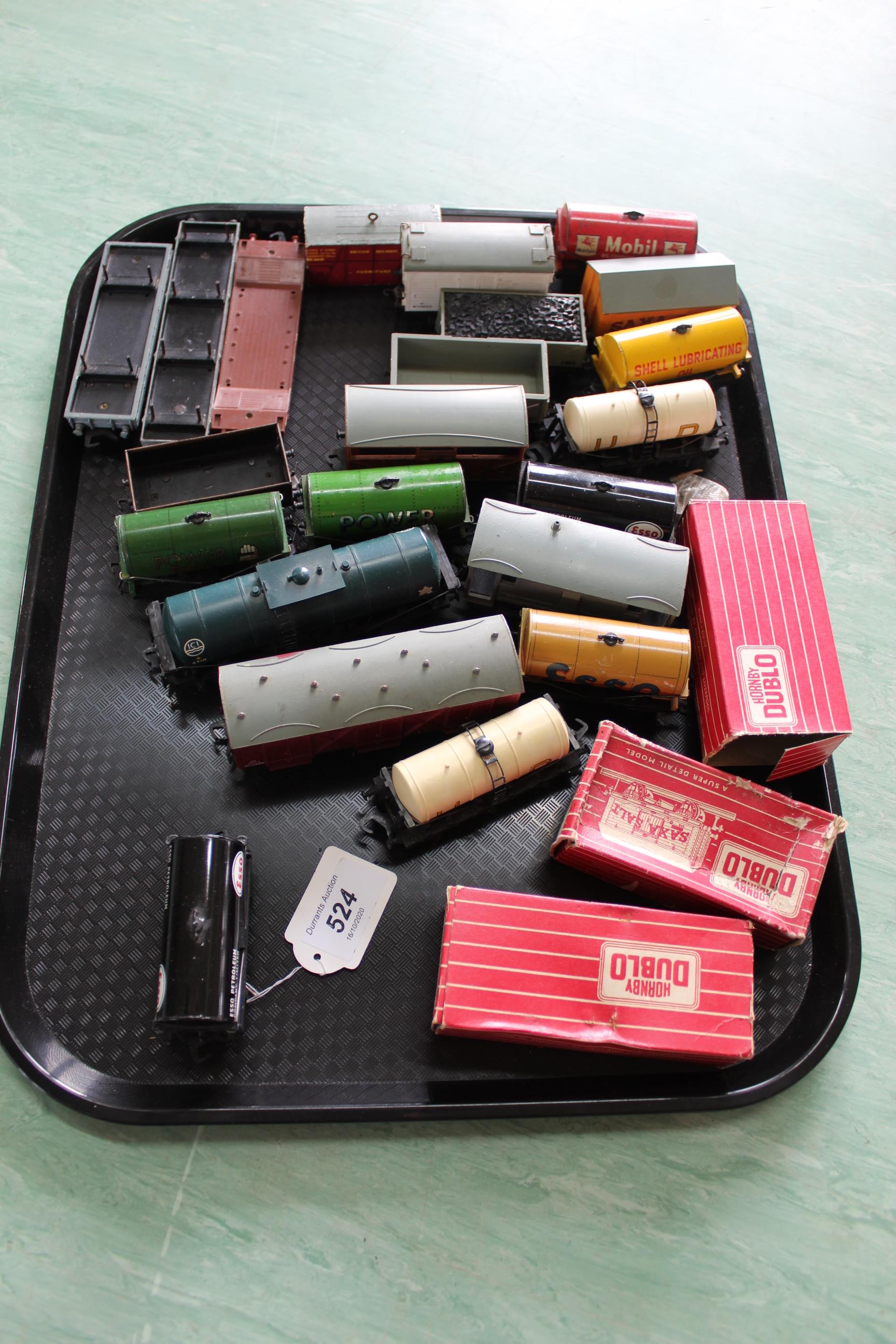 A tray of various Hornby Dublo wagons including advertising oil tankers and three empty boxes