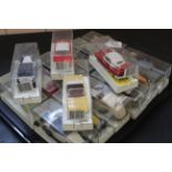 A tray with sixteen Solido cased cars