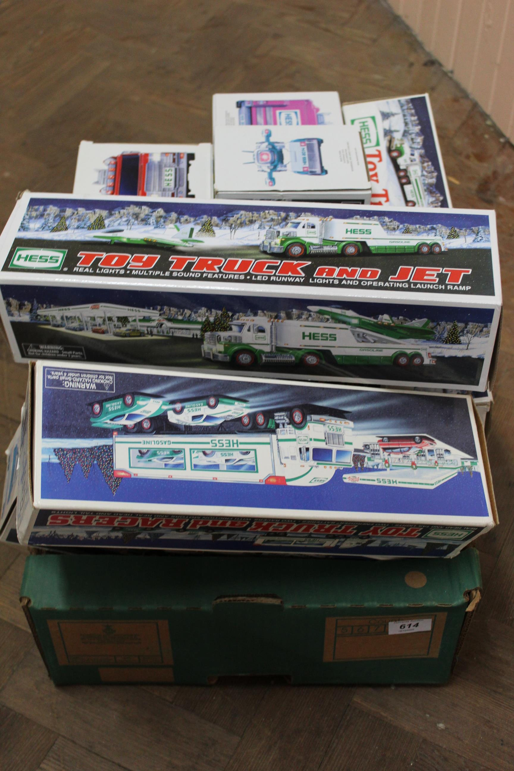 A box with eight 1990's 'Hess' trucks