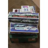 A box with eight 1990's 'Hess' trucks