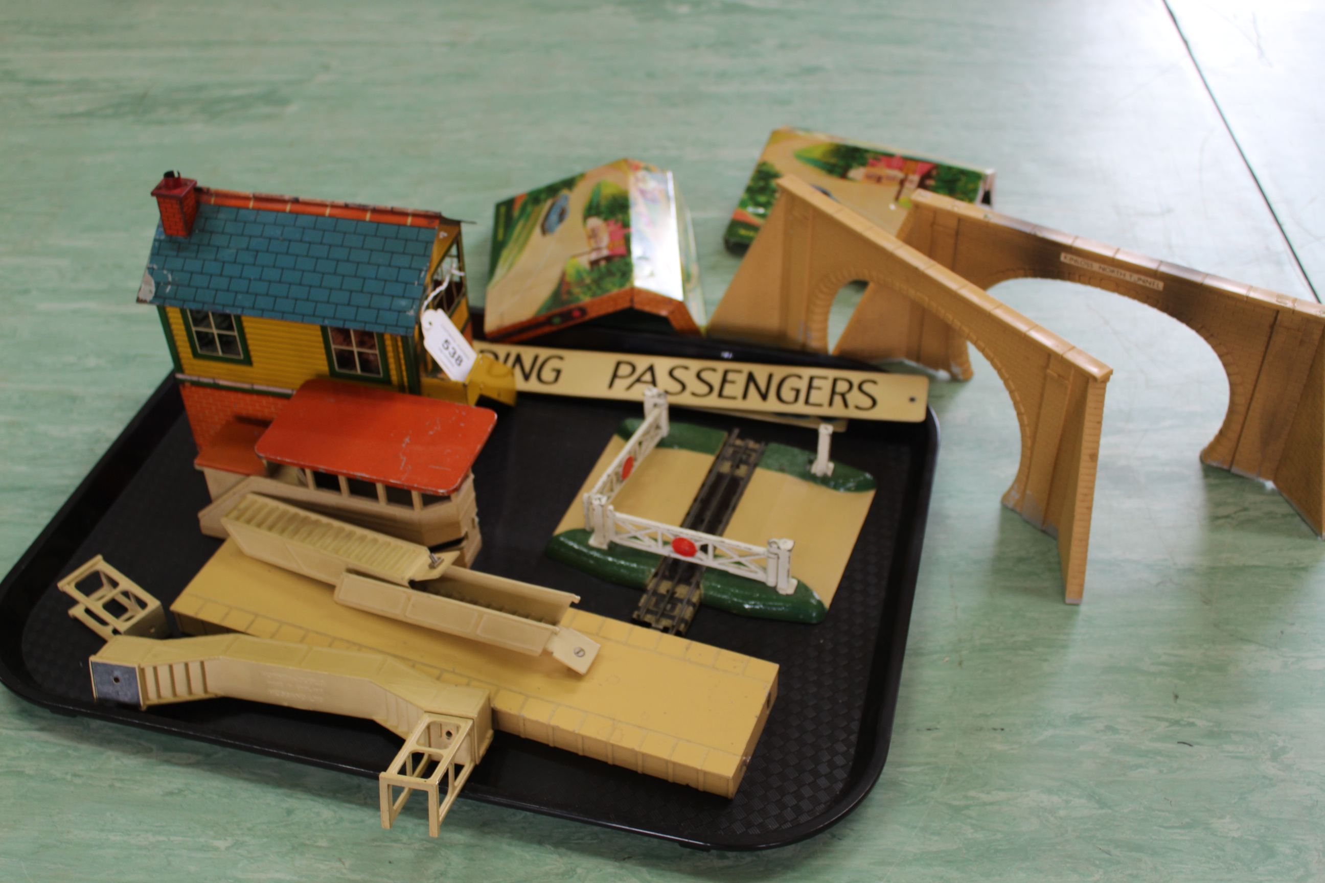 A tray of Hornby tin plate train set accessories including bridge,