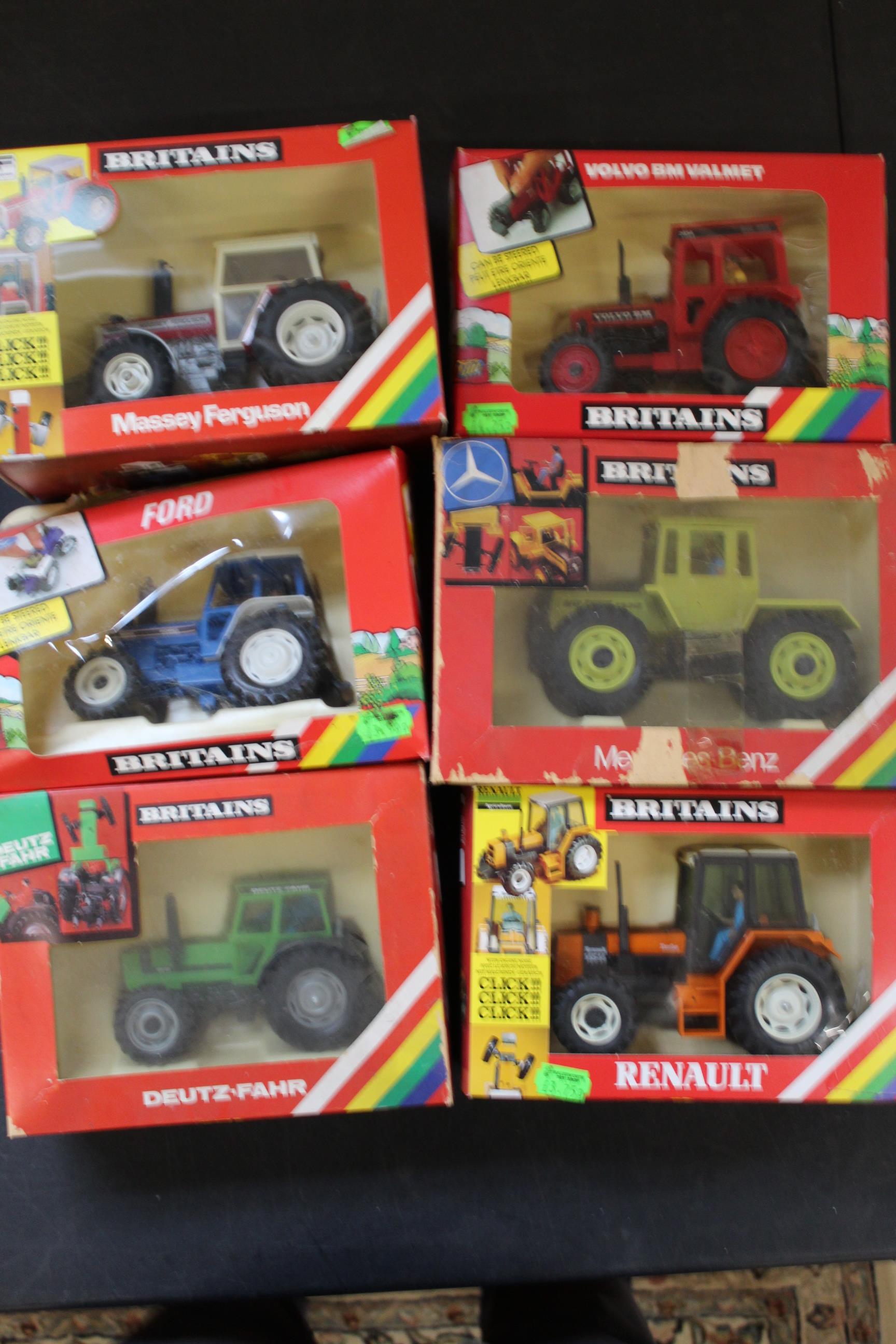 Six boxed Britains 1:32 scale 1980's tractors (two boxes with damage)