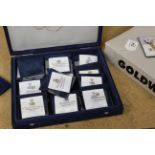 A Golden Wedding Anniversary coin collection comprising of thirteen silver commemorative coins,